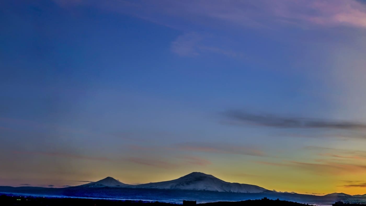 Ararat at dawn, bathed in soft golden light with B4Experience.