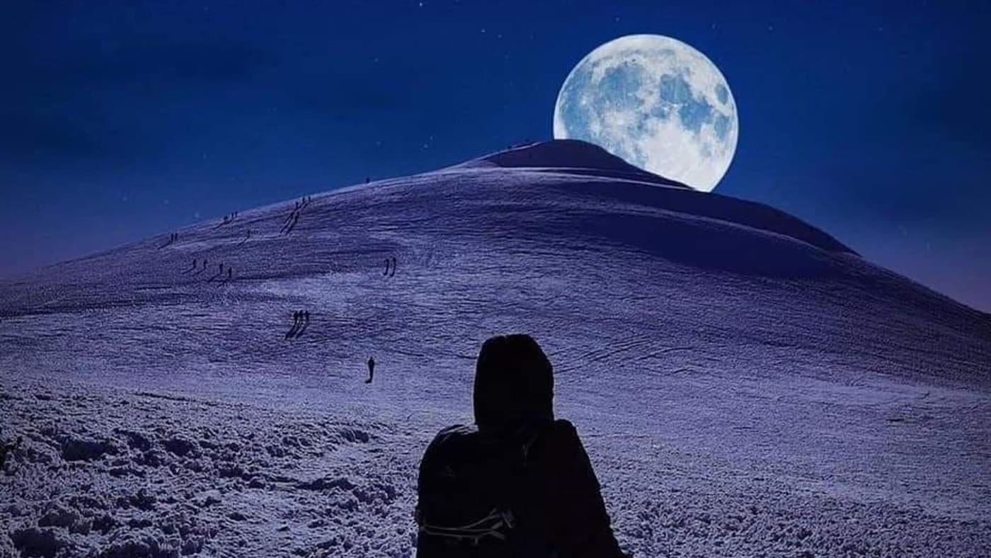 A climber watches the moon rise over Ararat - B4Experience.