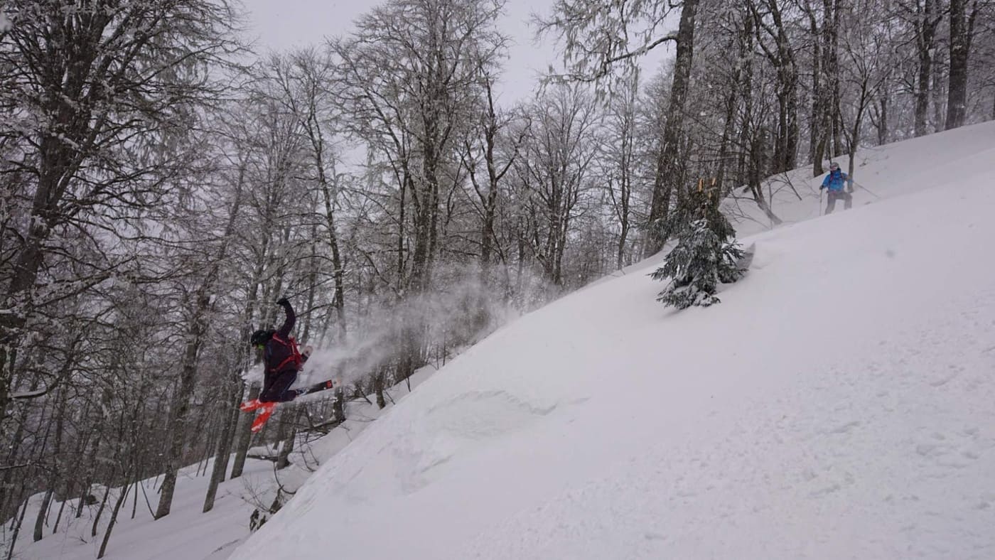 Skiers shred fresh powder through Georgia's forests with B4Experience.