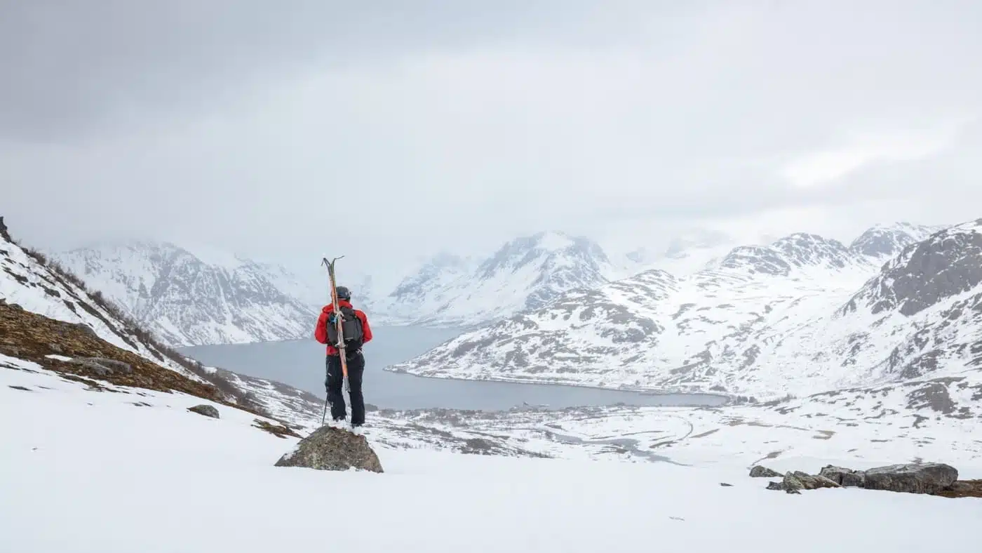 Skier takes in the magnificent views of the fjord in Tromso