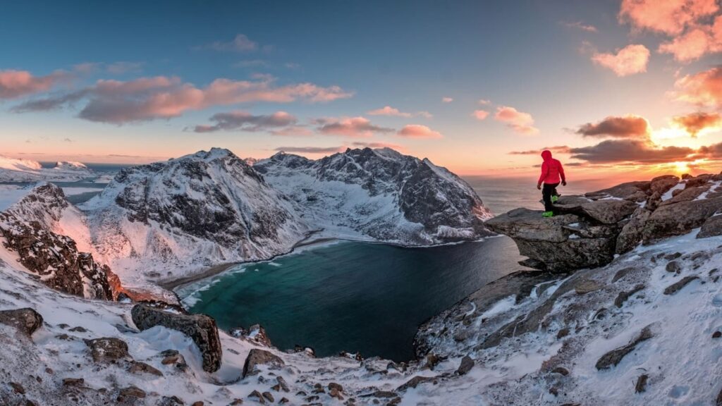 Wonderful views of a Lofoten fjord and a person watching