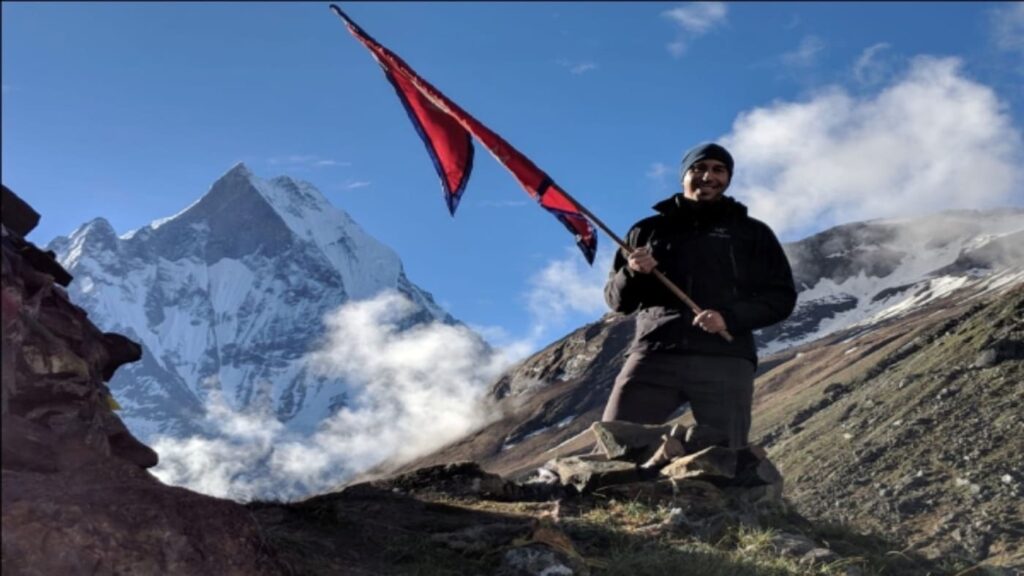 nepali with nepali flag in Annapurna bc trips B4Experience