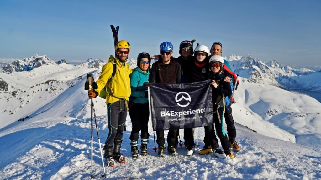 B4Experience ski group on the top of the mountain in Lofoten