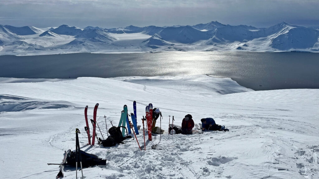 Group of skiers resting and enjoying the solitude of Svalbard