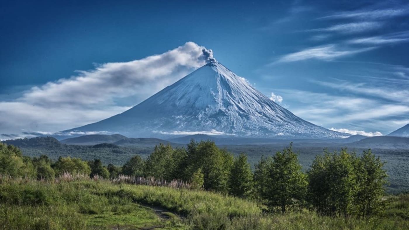 A majestic volcano dominates the Kamchatka landscape with B4Experience