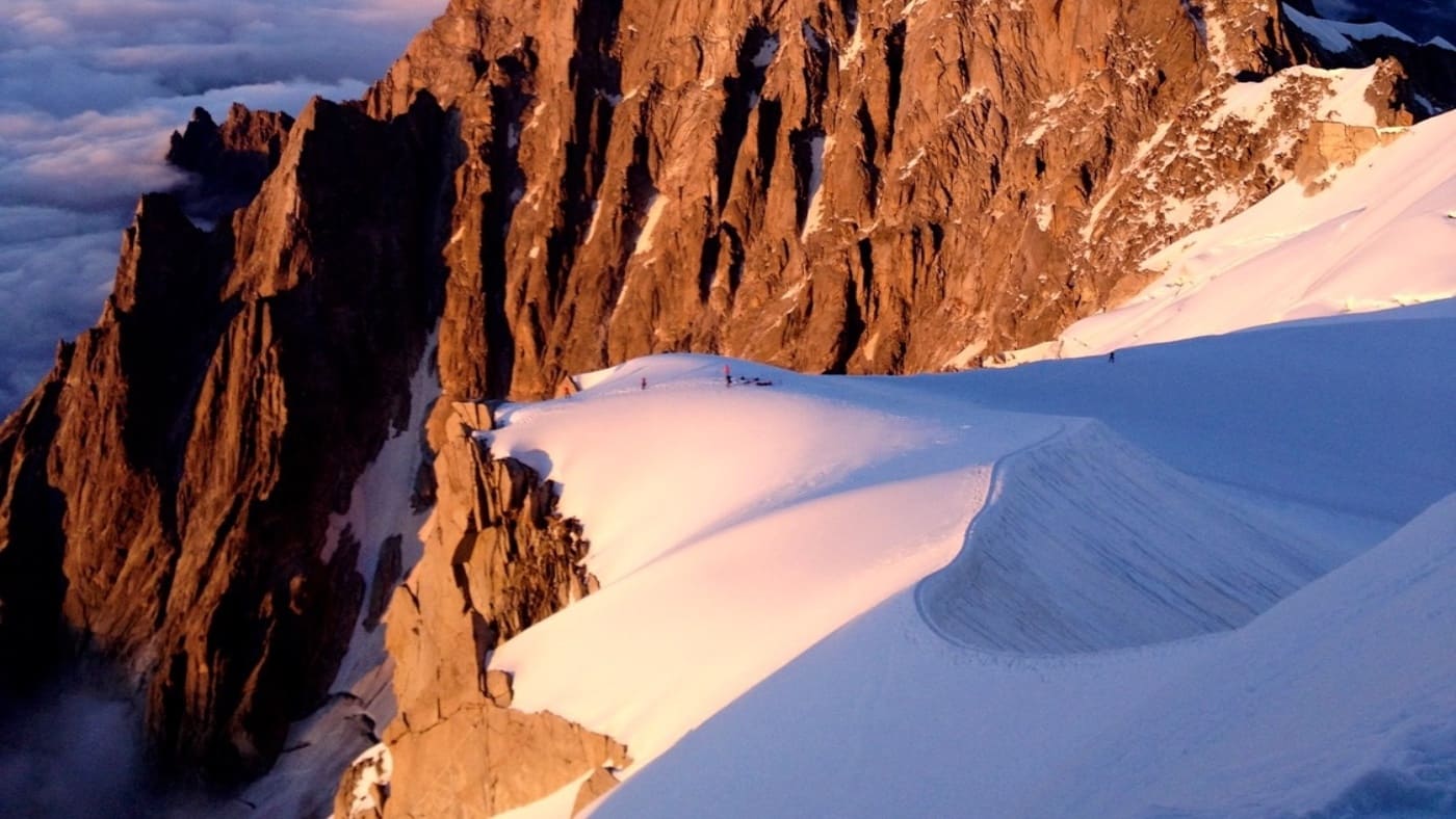 Golden light ignites Mont Blanc's rugged peaks at sunset with B4Experience