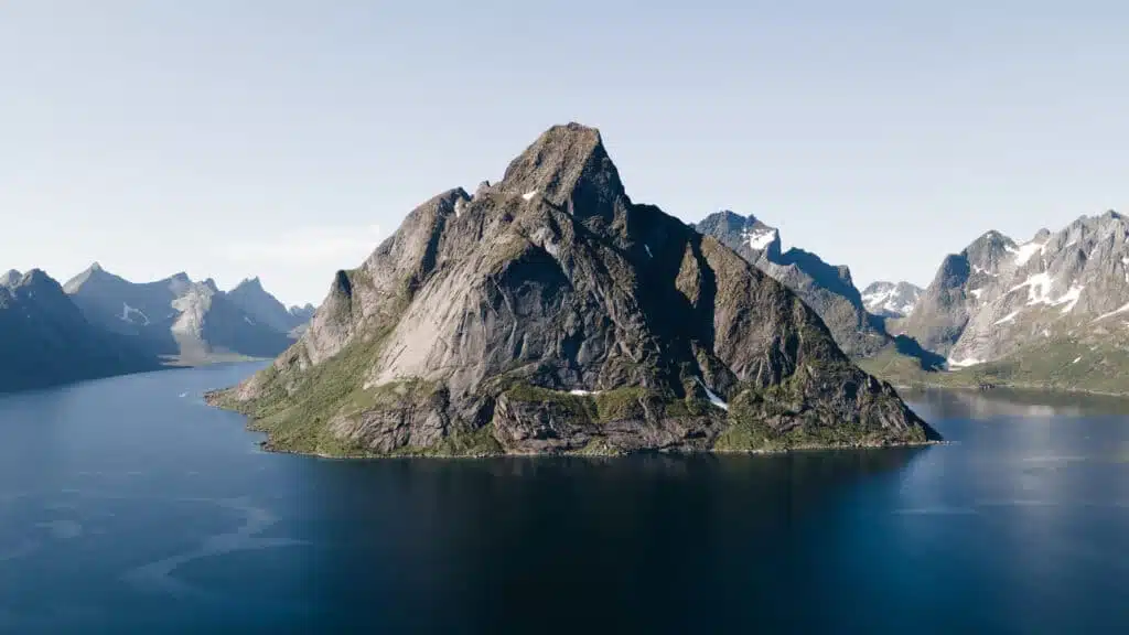 Majestic mountain rising form the waters near Reine, Lofoten with B4Experience.