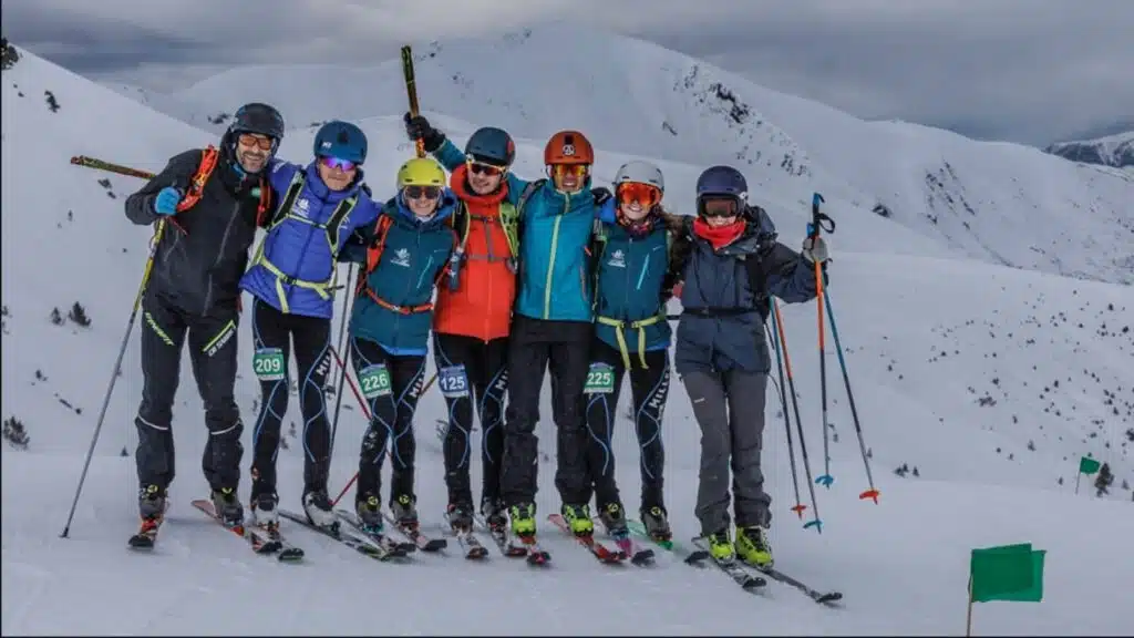 Group of skiers posing on a snow mountain in Tignes Alps with B4Experience