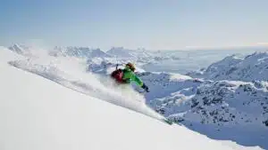 Carving through fresh powder in Greenland's vast alpine landscape with B4Experience