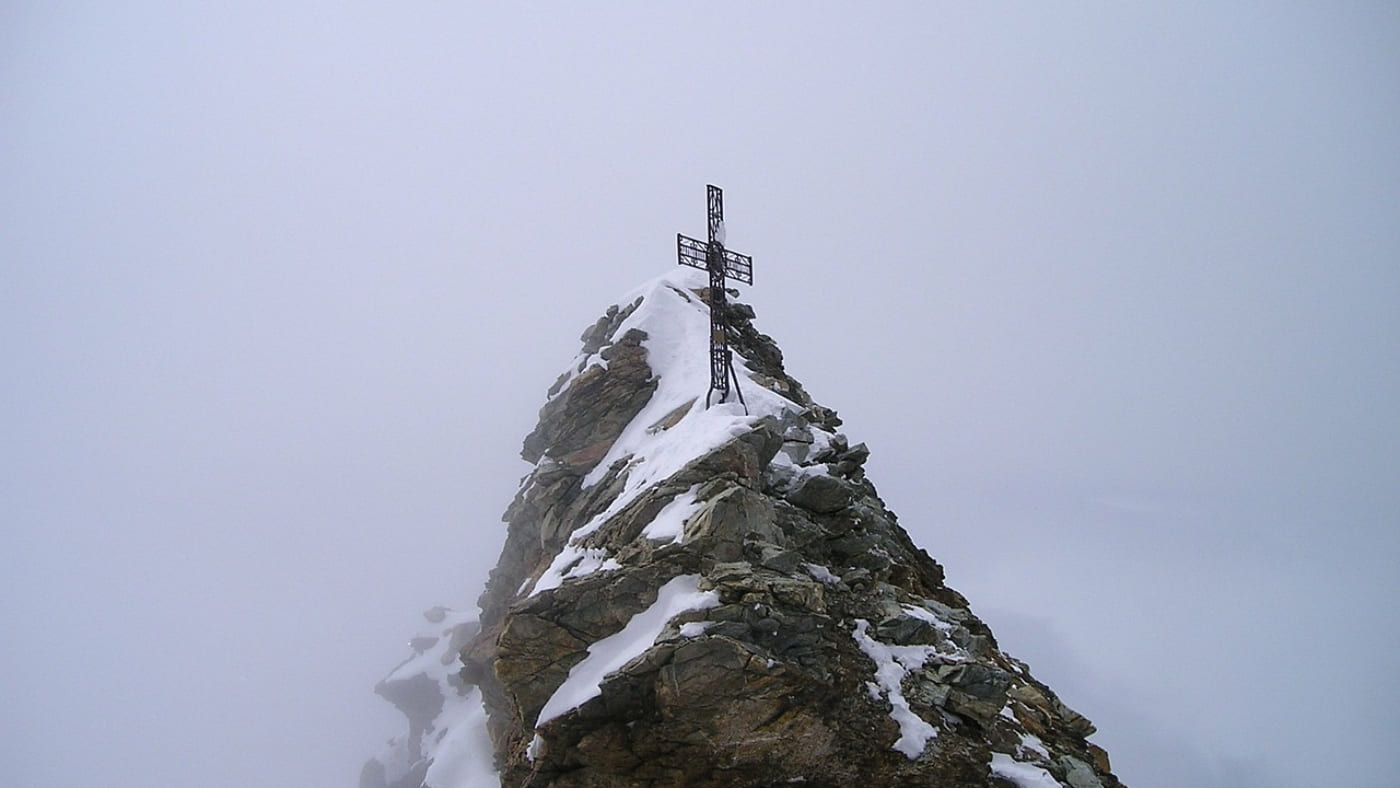 Summit of the Matterhorn with a metal cross with B4Experience