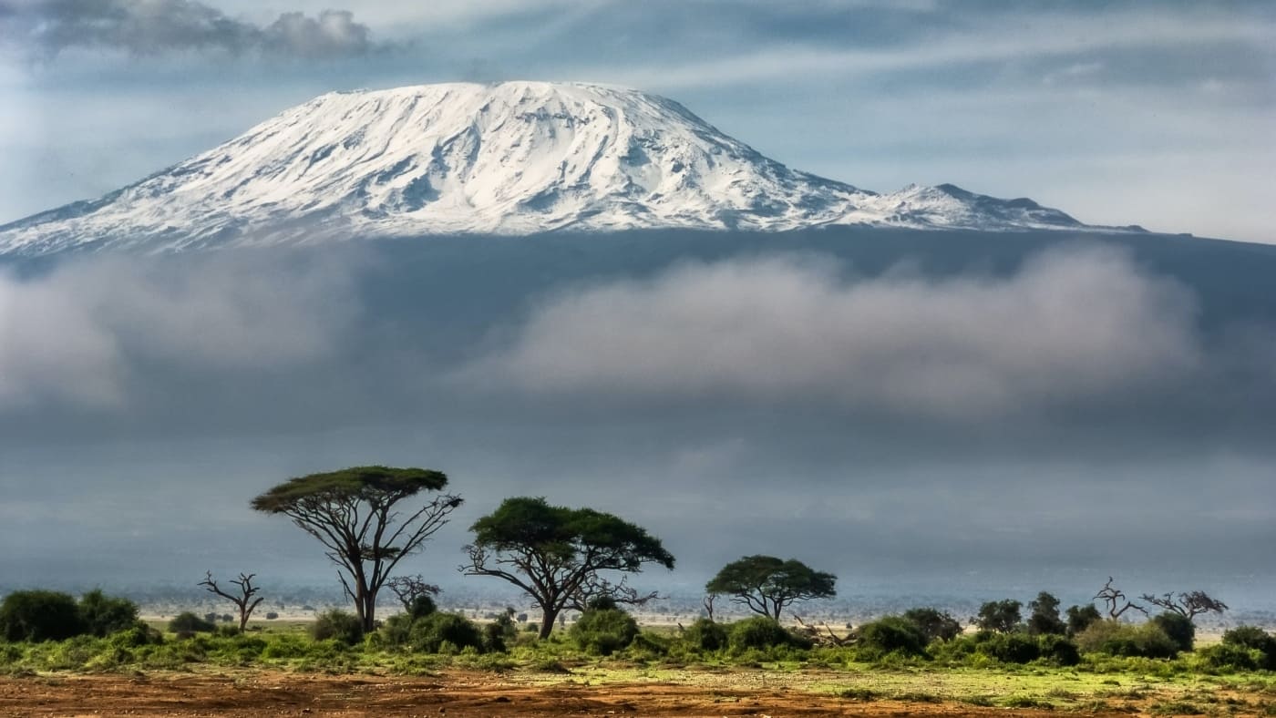 Mount Kilimanjaro rising over the African savanna with B4Experience