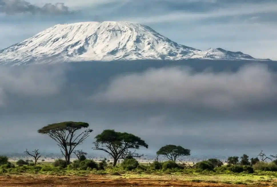 Mount Kilimanjaro towering over the African savannah with B4Experience