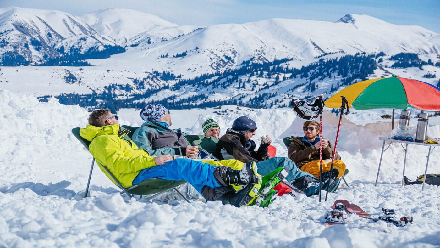 Relaxing in the snow after an epic Kyrgyzstan Jyrgalan ski trip with B4Experience