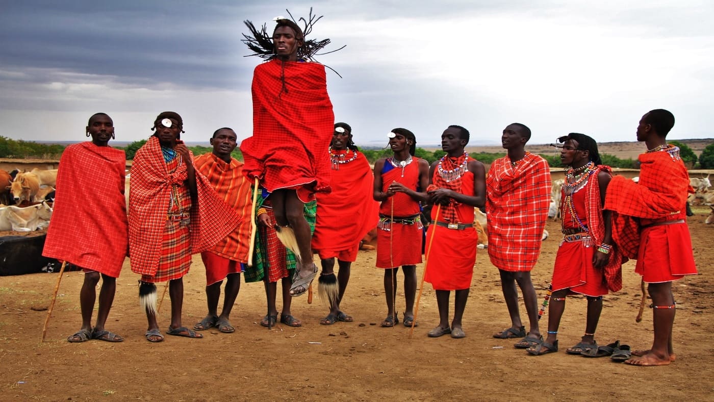 Masai warriors perform traditional jumping dance in Tanzania with B4Experience