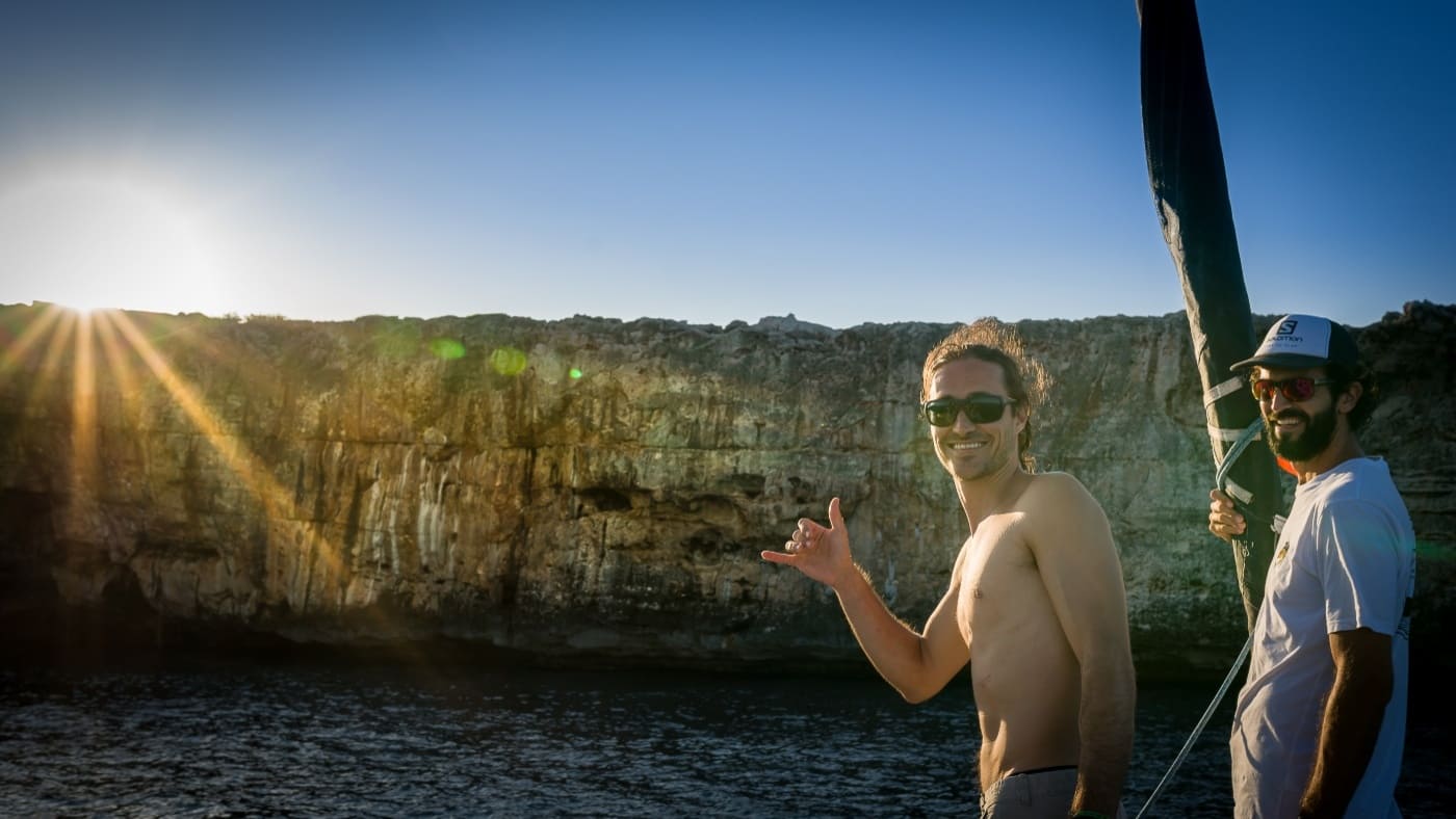 Psychobloc climbers enjoying Mallorca's sea cliffs at sunset with B4Experience