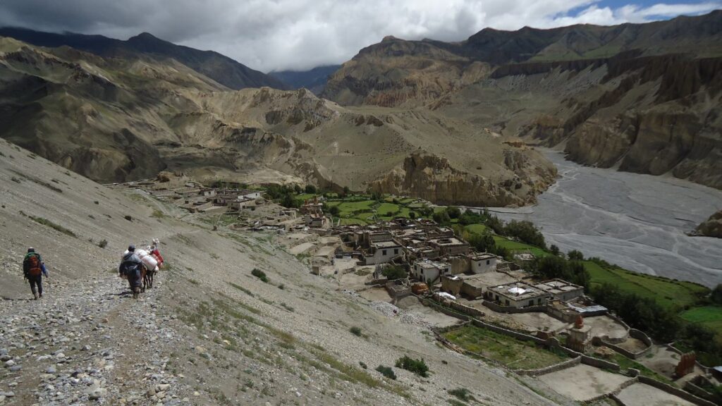 Walking through the rugged landscapes of Mustang Chalie - B4Experience